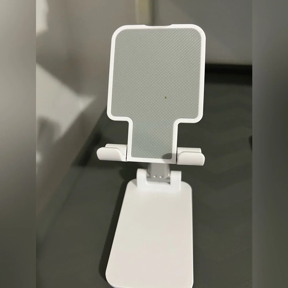 Cell phone stand for use at home